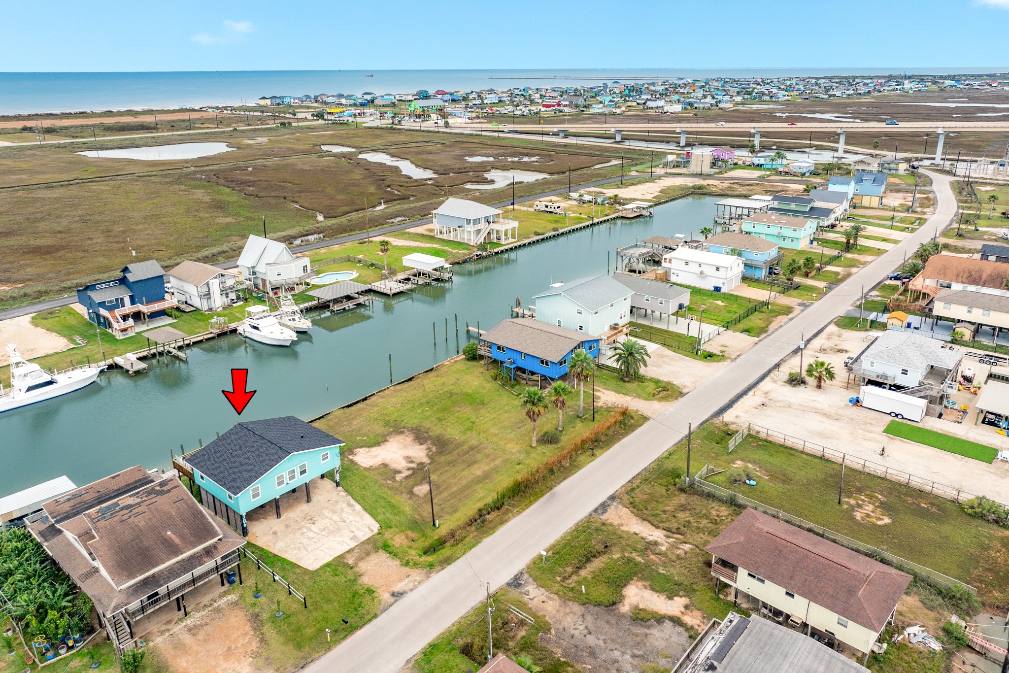 306 Pompano Lane Surfside Beach, TX 77541 - Photo 35 of 37 a view of an ocean and a building view