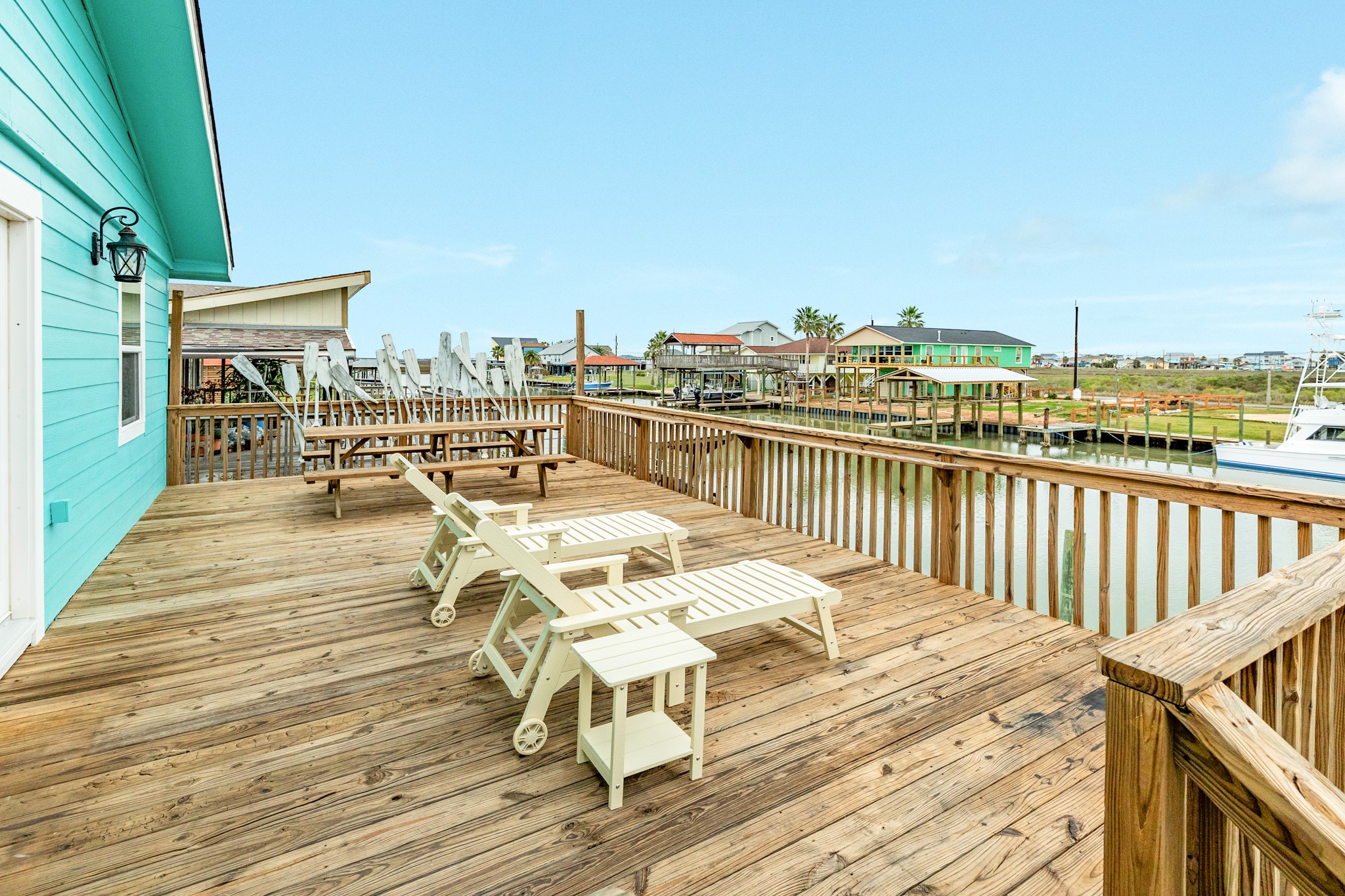306 Pompano Lane Surfside Beach, TX 77541 - Photo 9 of 37 a view of a balcony with wooden floor