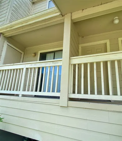a view of porch with a chair