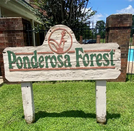 a view of sign board with retail shop and sign board