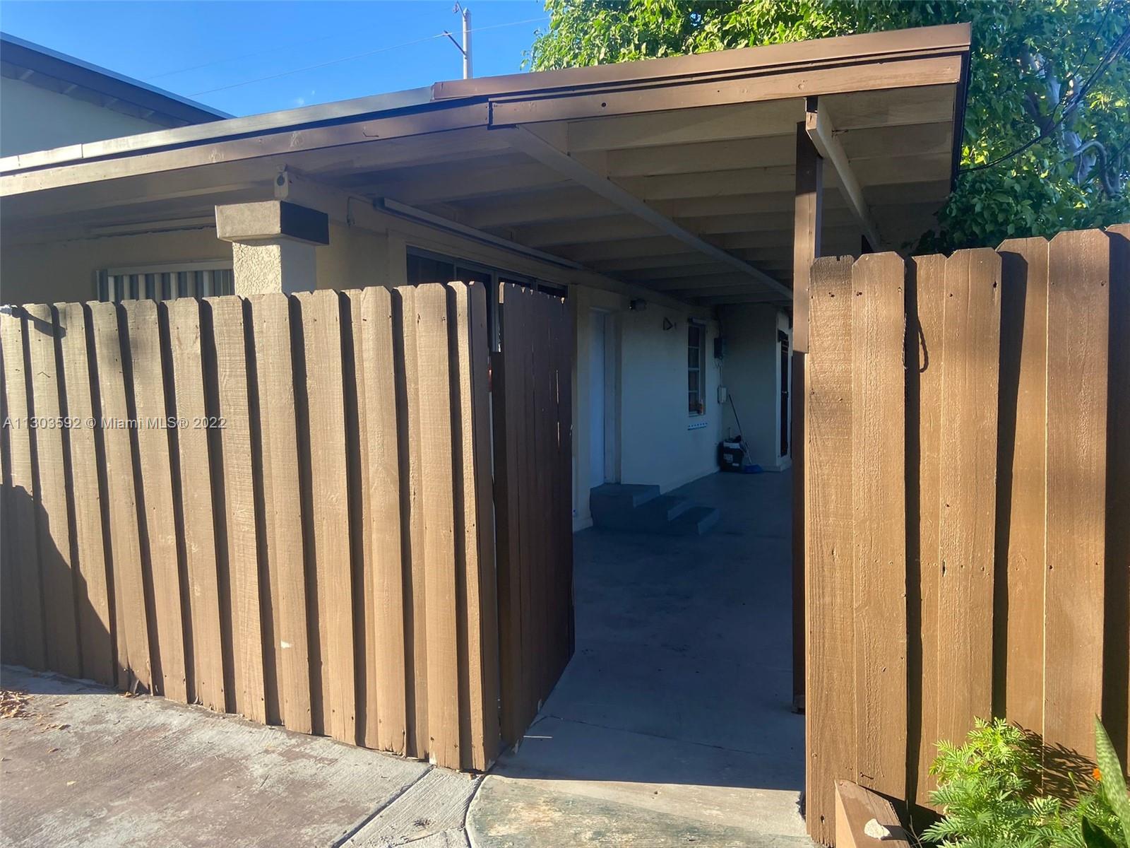 a view of a house with a wooden door