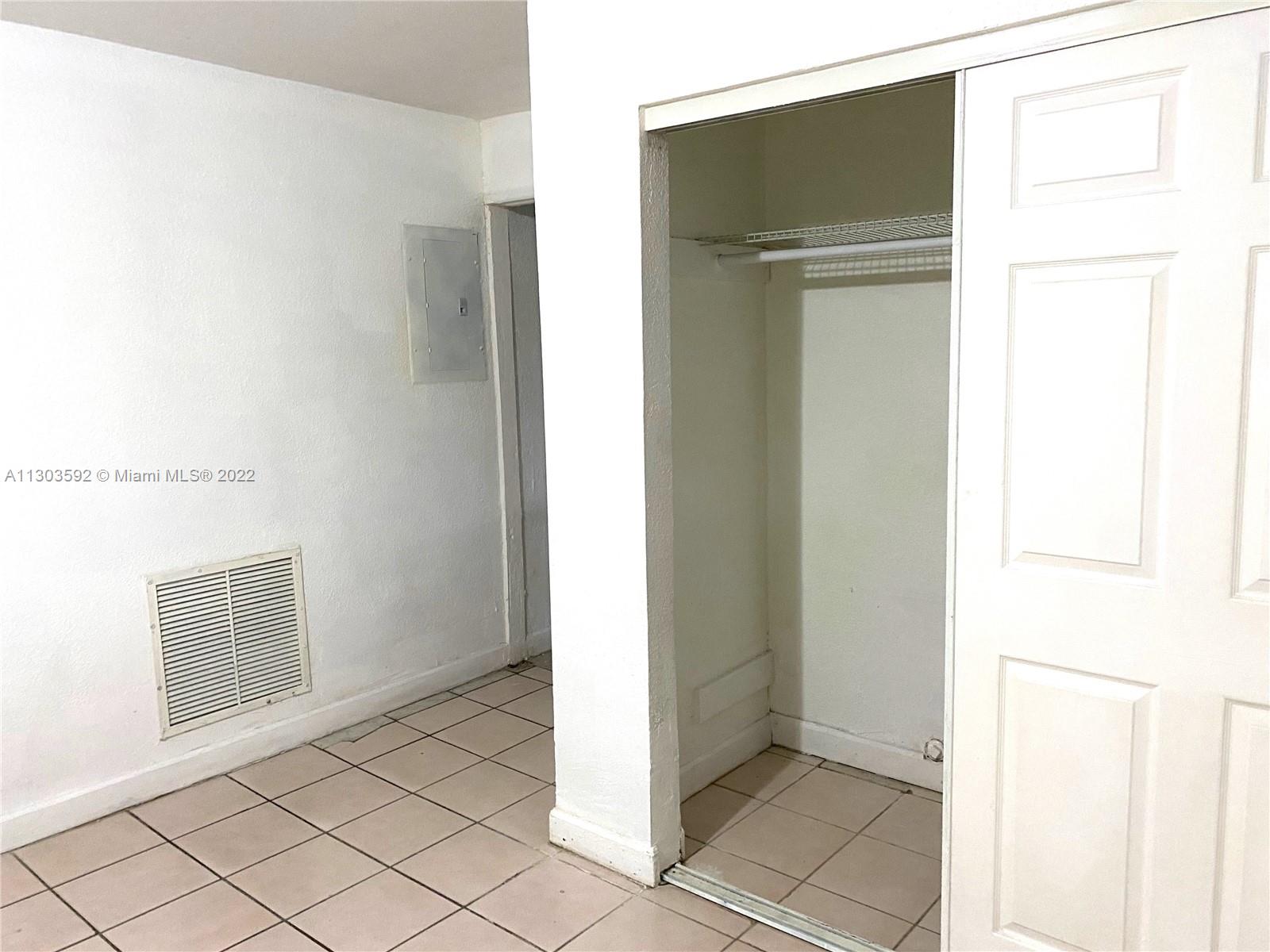 4763 Northwest 3rd Street, Unit 1A Miami, FL 33126 - Photo 6 of 14 a view of an empty room
