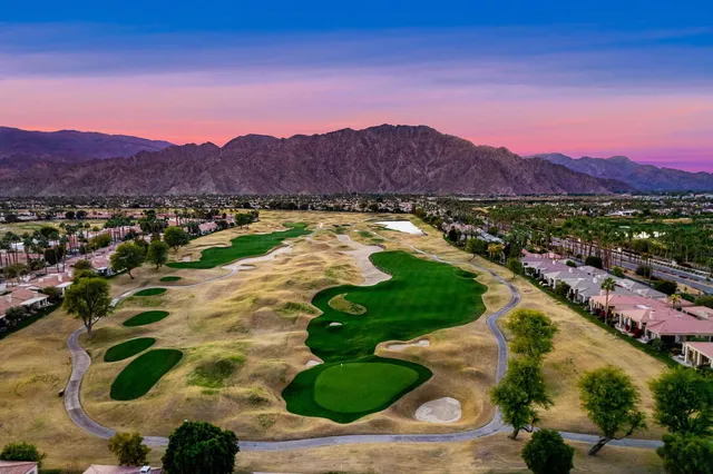 a view of a backyard with a patio