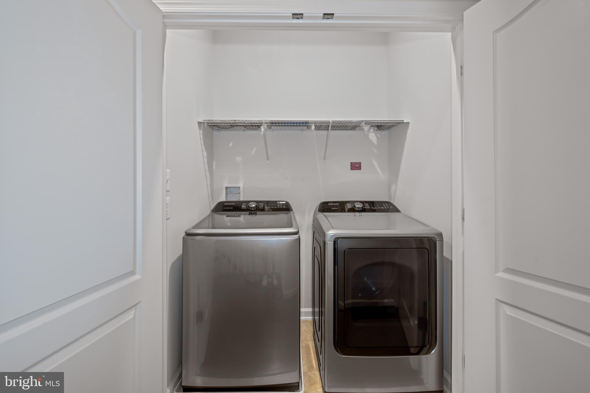 7715 Cresap Lane Hanover, MD 21076 - Photo 28 of 42 a utility room with dryer and washer