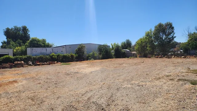 a view of a backyard of a house