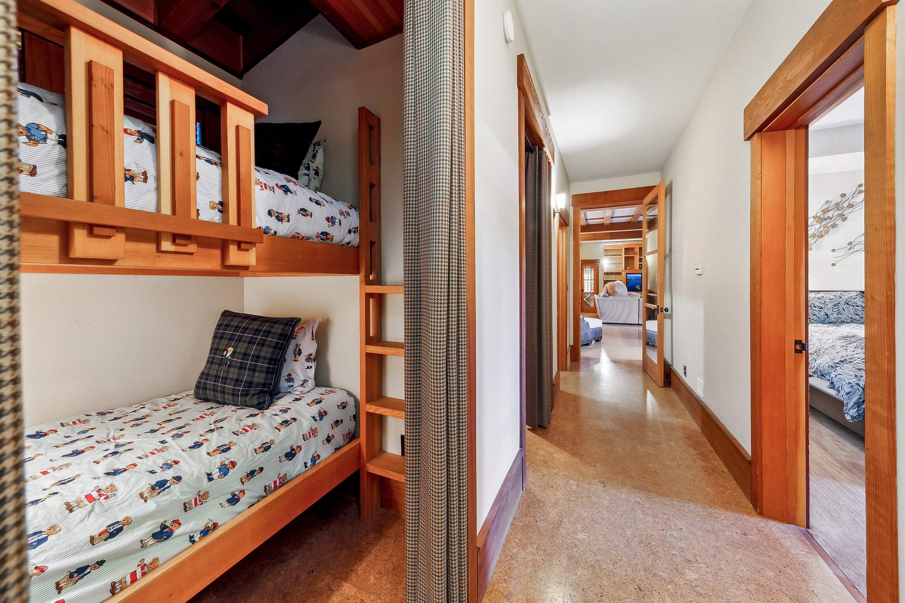 2221 Silver Fox Truckee, CA 96161 - Photo 20 of 28 a bedroom with a bed and wooden floor