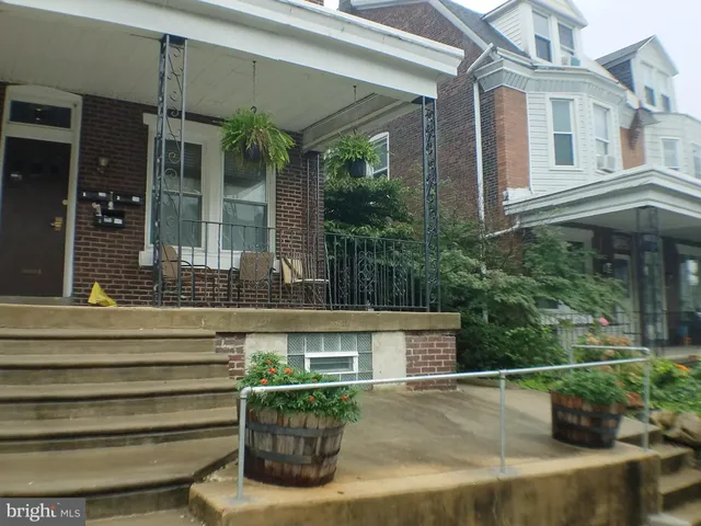 a view of a building with a porch