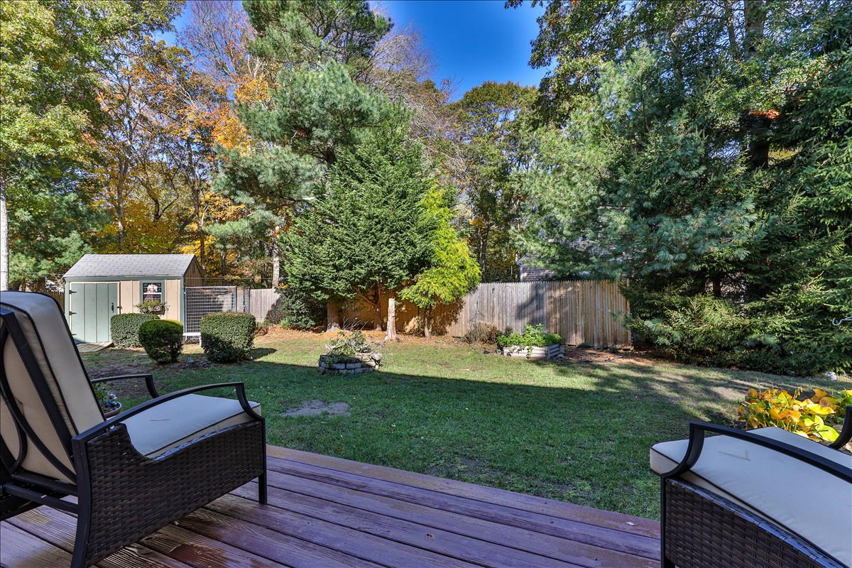 524 Prince Hinckley Road Centerville, MA 02632 - Photo 38 of 43 a view of a house with backyard and sitting area