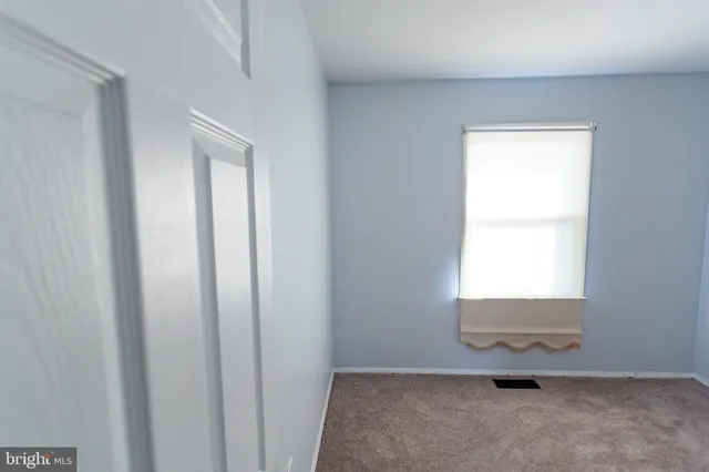 a view of a livingroom with a window