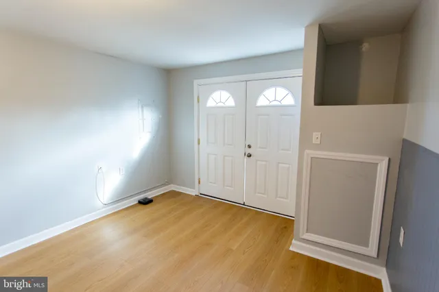 an empty room with windows