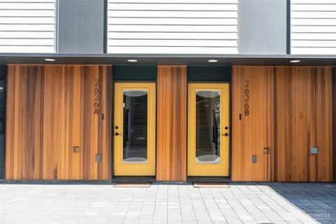 a kitchen with cabinets and appliances