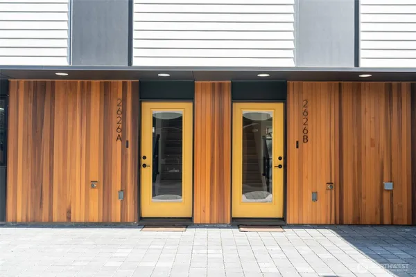 a kitchen with cabinets and appliances