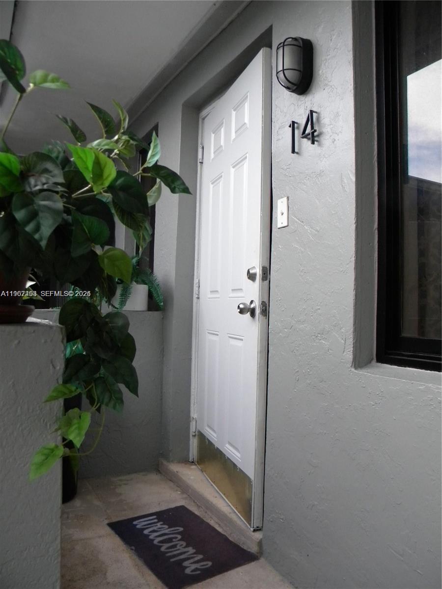 3475 Southwest 1st Avenue, Unit 14 Miami, FL 33145 - Photo 3 of 22 a view of bathroom with a potted plant