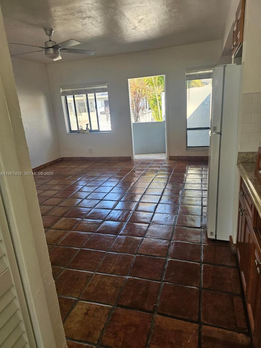 3475 Southwest 1st Avenue, Unit 14 Miami, FL 33145 - Photo 4 of 22 a view of an empty room and window