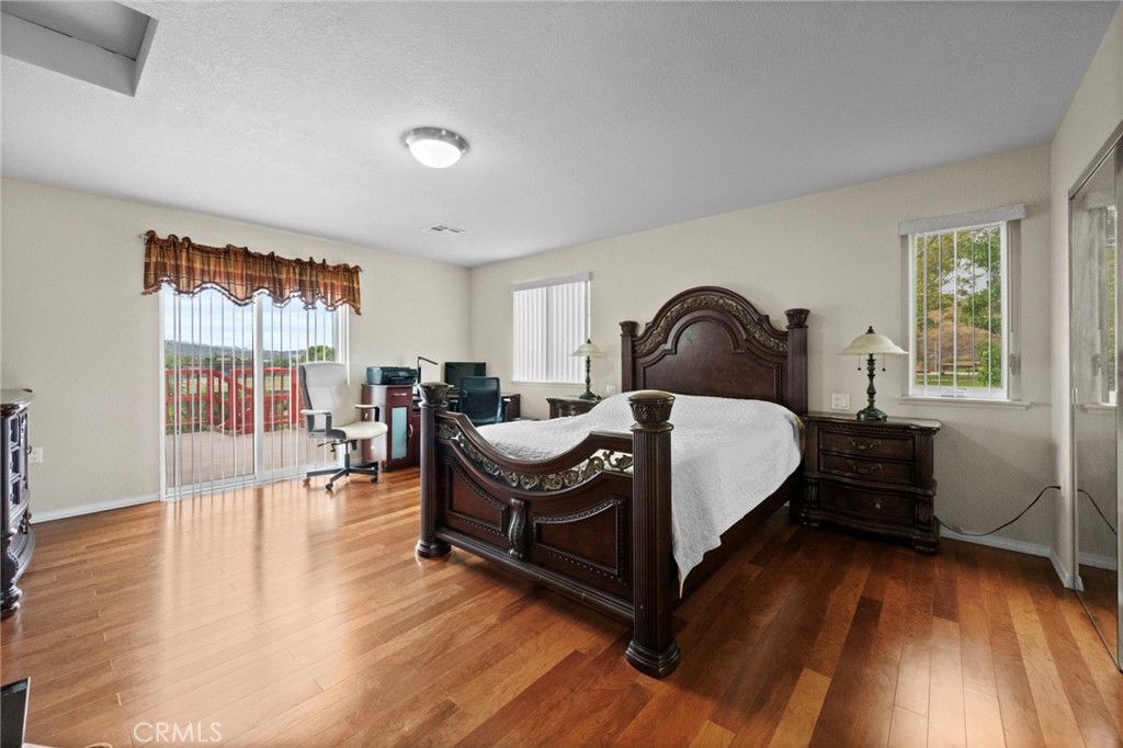 605 Bronco Way Walnut, CA 91789 - Photo 39 of 69 a bedroom with a bed and large window