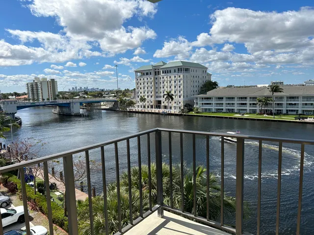a view of a balcony with city view