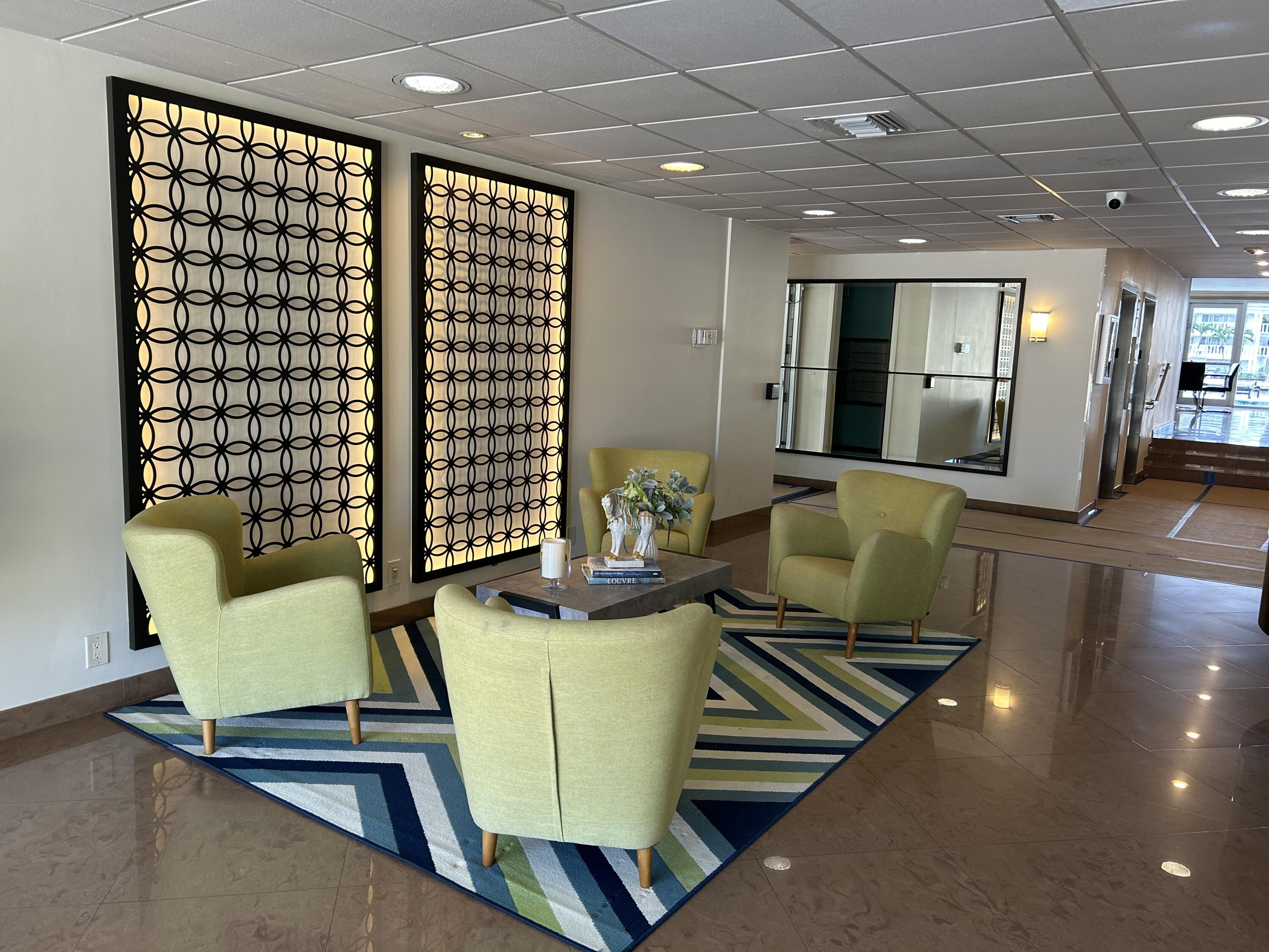 3233 Northeast 32nd Avenue, Unit 503 Fort Lauderdale, FL 33308 - Photo 2 of 15 a view of a living room and dining room