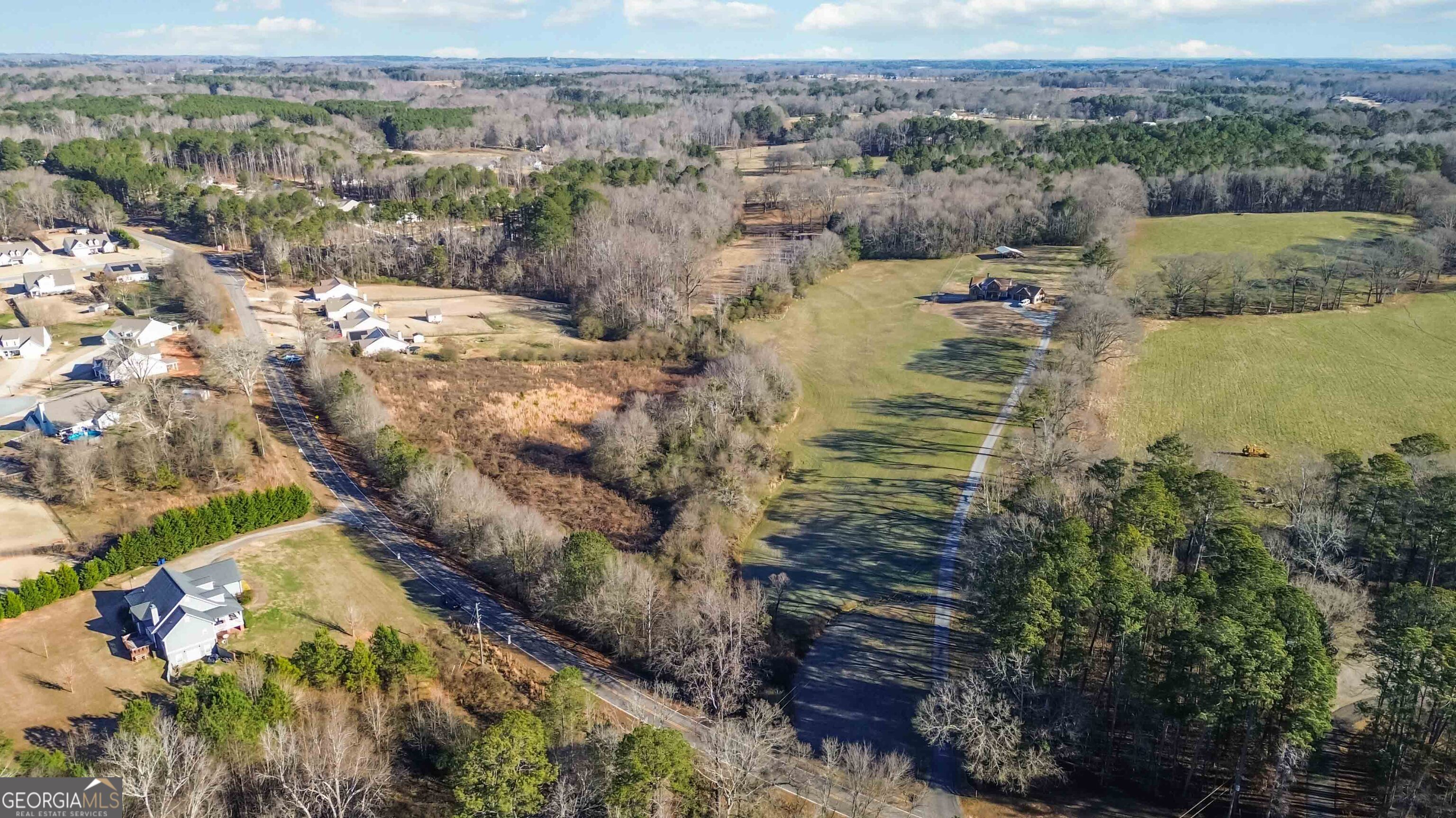 a view of a lake with mountains in the background