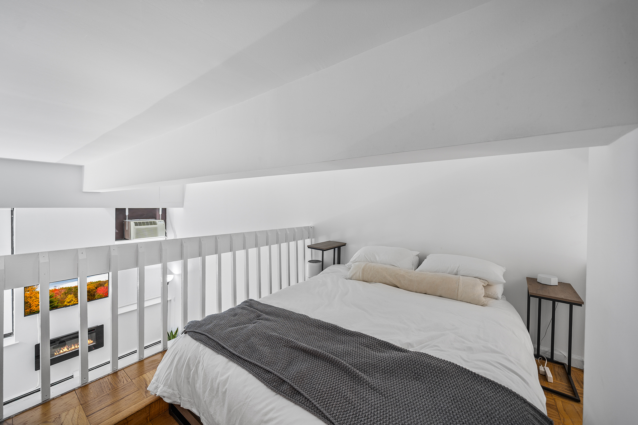 350 East 62nd Street, Unit 1M Manhattan, NY 10065 - Photo 15 of 18 a bedroom with a bed and white walls