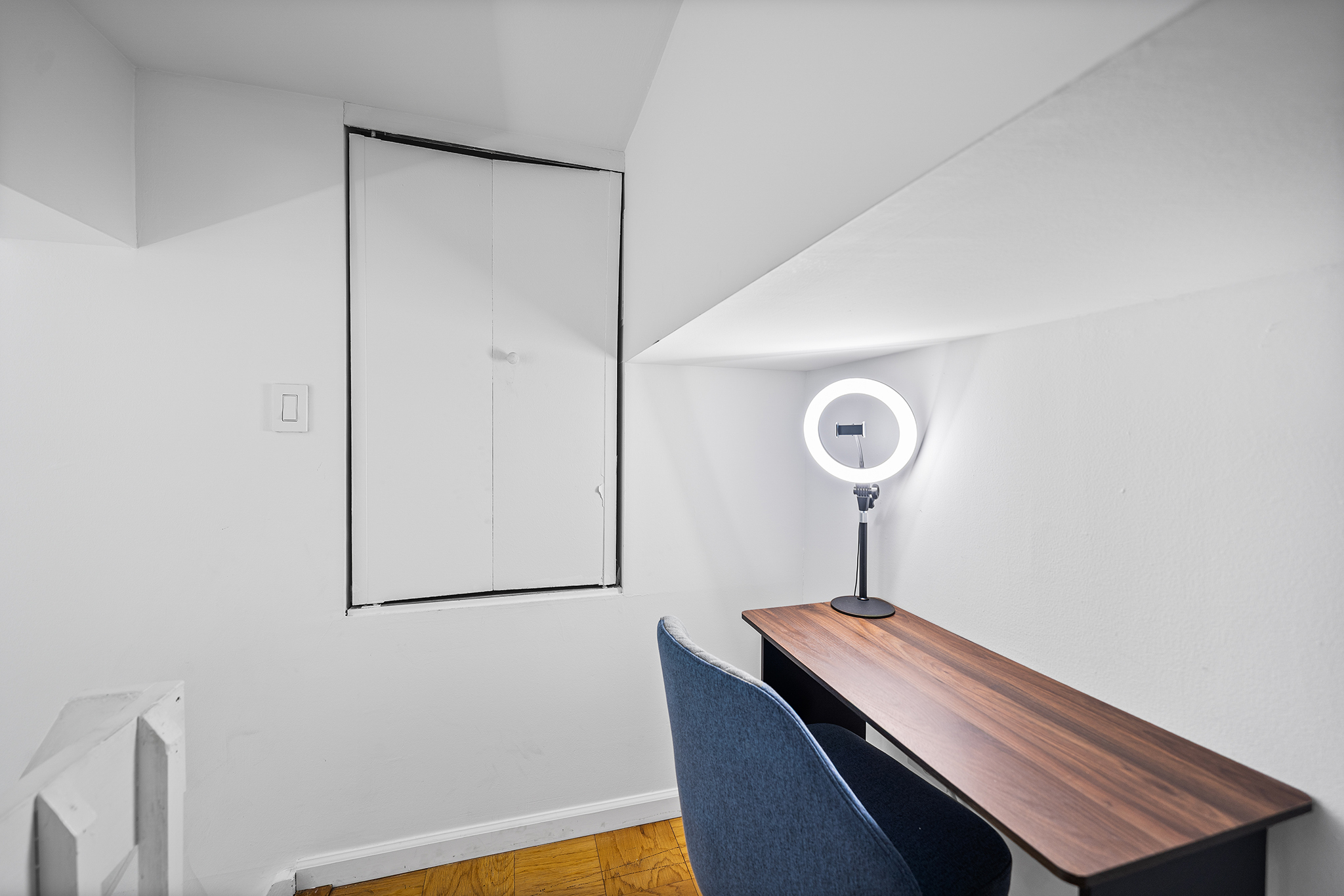 350 East 62nd Street, Unit 1M Manhattan, NY 10065 - Photo 16 of 18 a room with a table and a potted plant