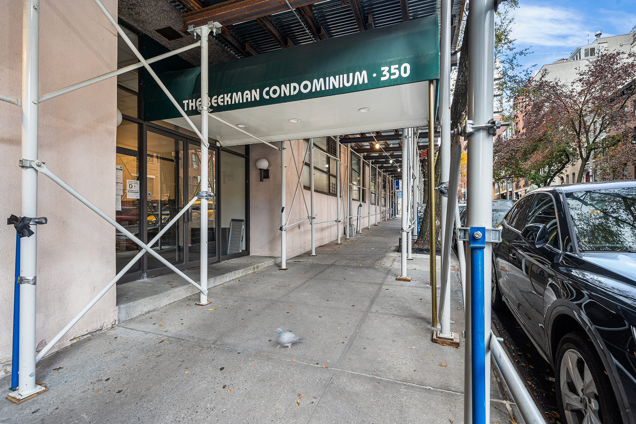 350 East 62nd Street, Unit 1M Manhattan, NY 10065 - Photo 3 of 18 a view of a room with gym equipment
