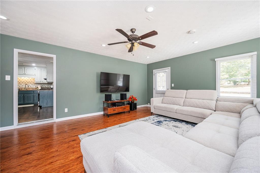 70 Countryside Lane Covington, GA 30016 - Photo 13 of 30 a bedroom with furniture and a flat screen tv
