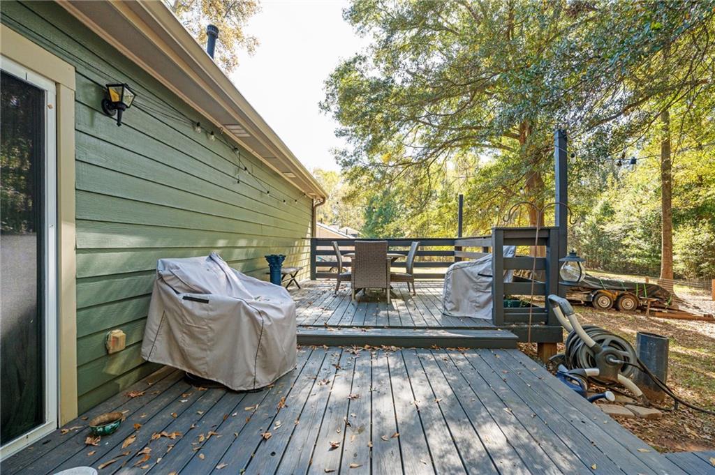 70 Countryside Lane Covington, GA 30016 - Photo 24 of 30 a view of deck with patio