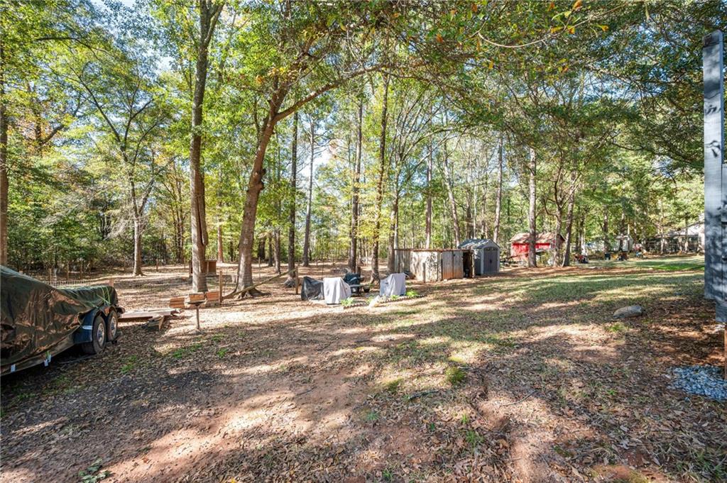 70 Countryside Lane Covington, GA 30016 - Photo 27 of 30 a view of street with trees
