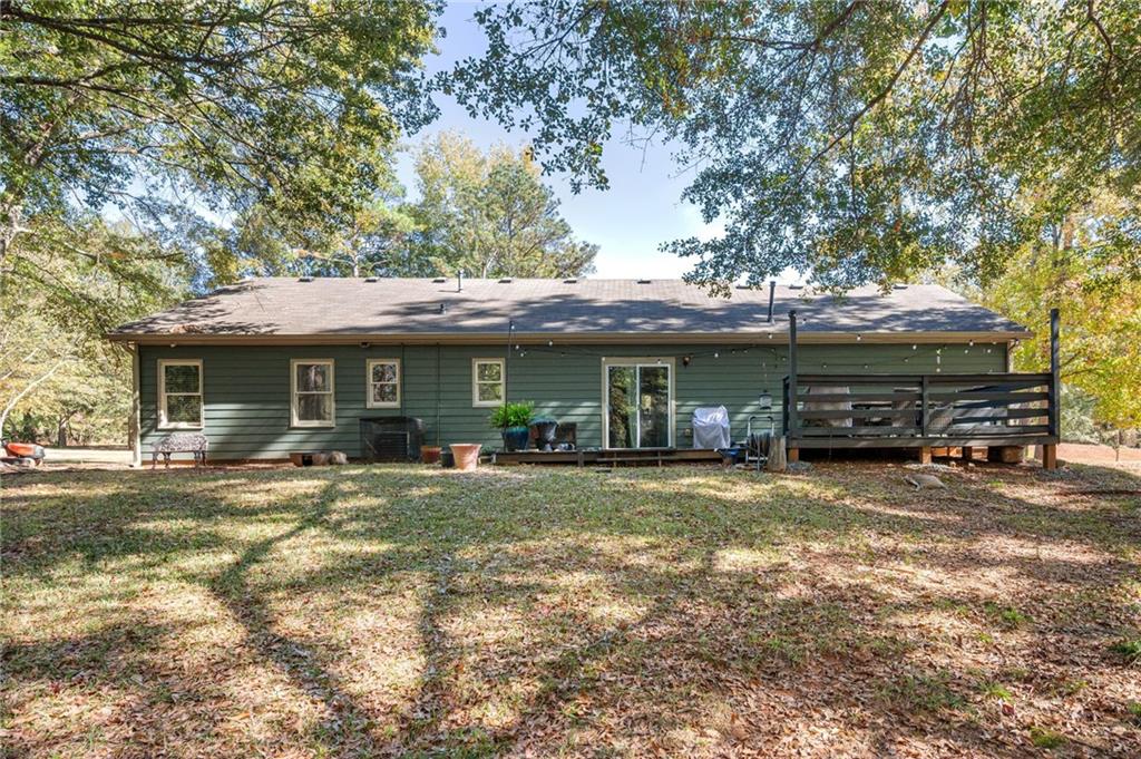 70 Countryside Lane Covington, GA 30016 - Photo 29 of 30 a front view of a house with a garden
