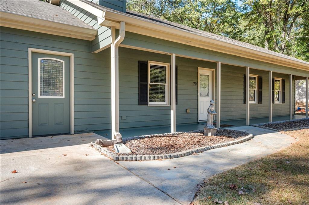 70 Countryside Lane Covington, GA 30016 - Photo 4 of 30 a front view of a house