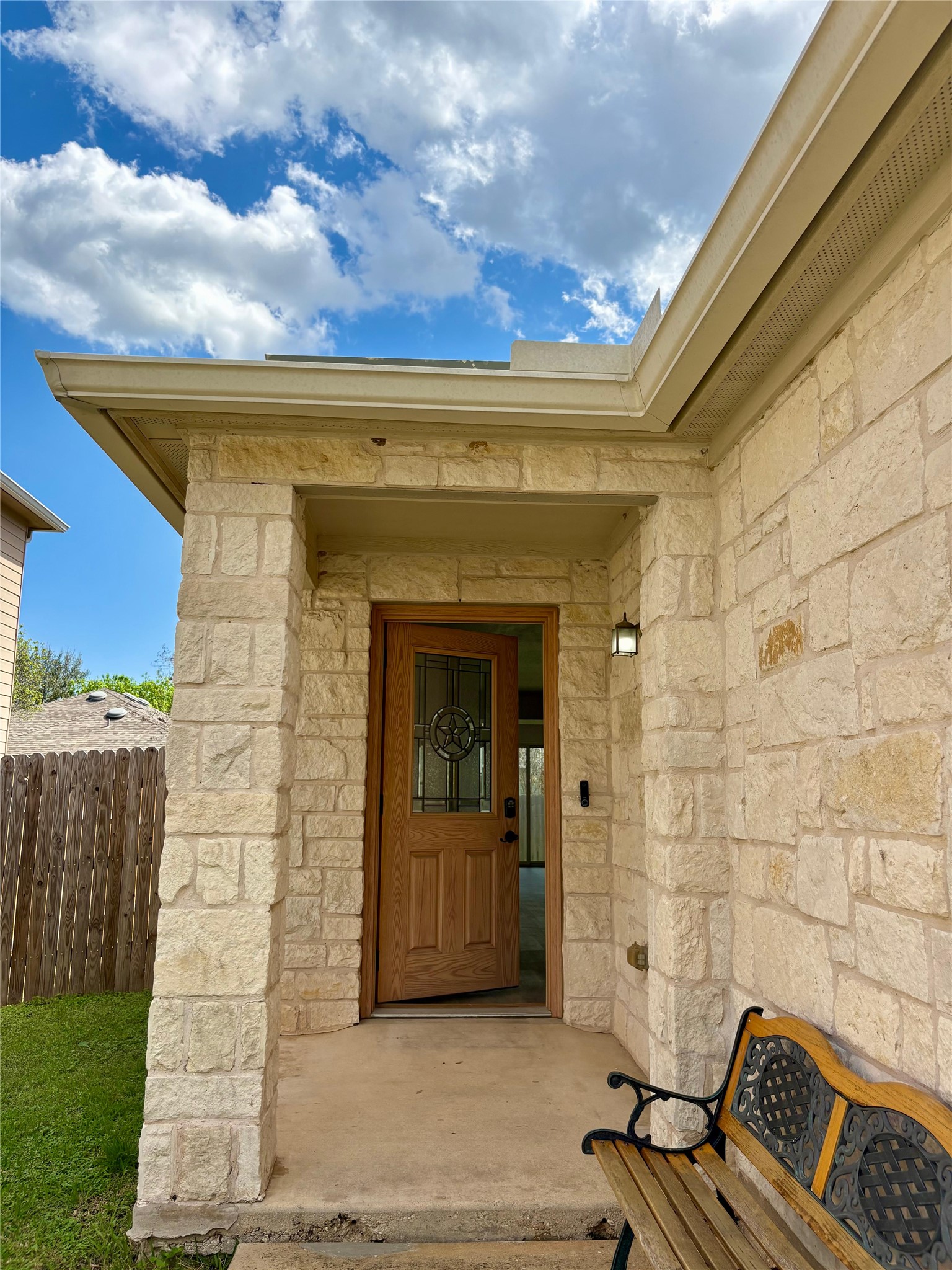 8003 Bannock Lane Austin, TX 78747 - Photo 3 of 40 Entrance to property with stone siding