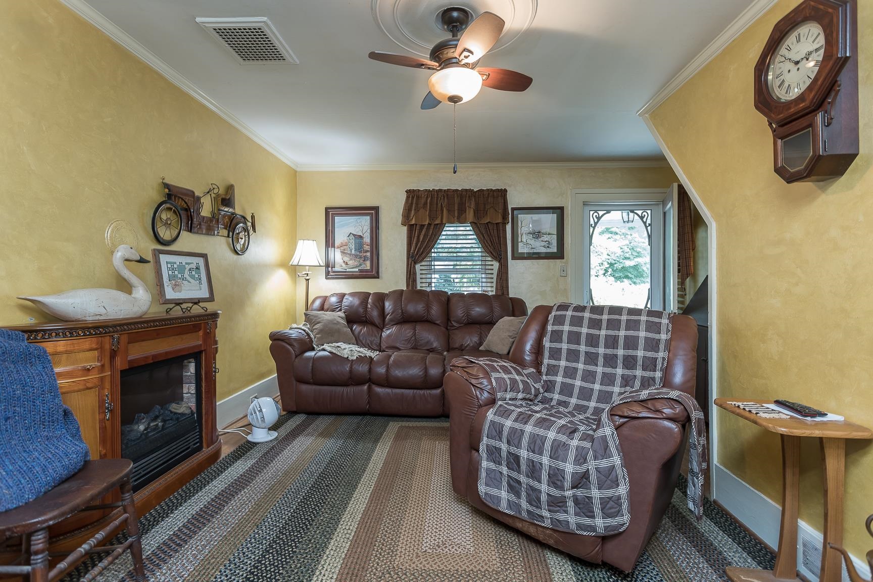 711 Free Mason Run Road Mount Solon, VA 22843 - Photo 35 of 70 a living room with furniture and a fireplace