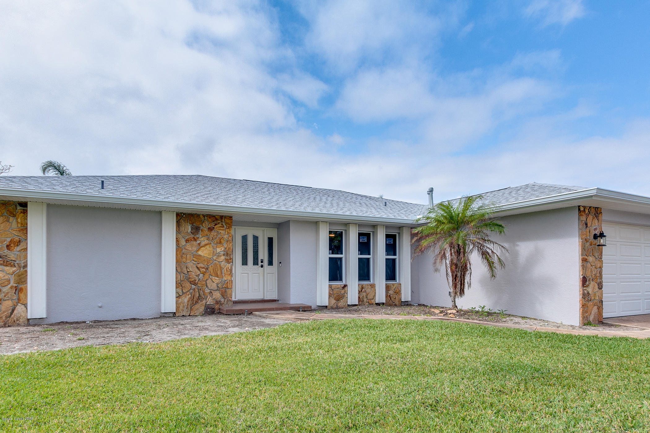 415 Coach Road Satellite Beach, FL 32937 - Photo 3 of 28 03_415CoachRoad9291