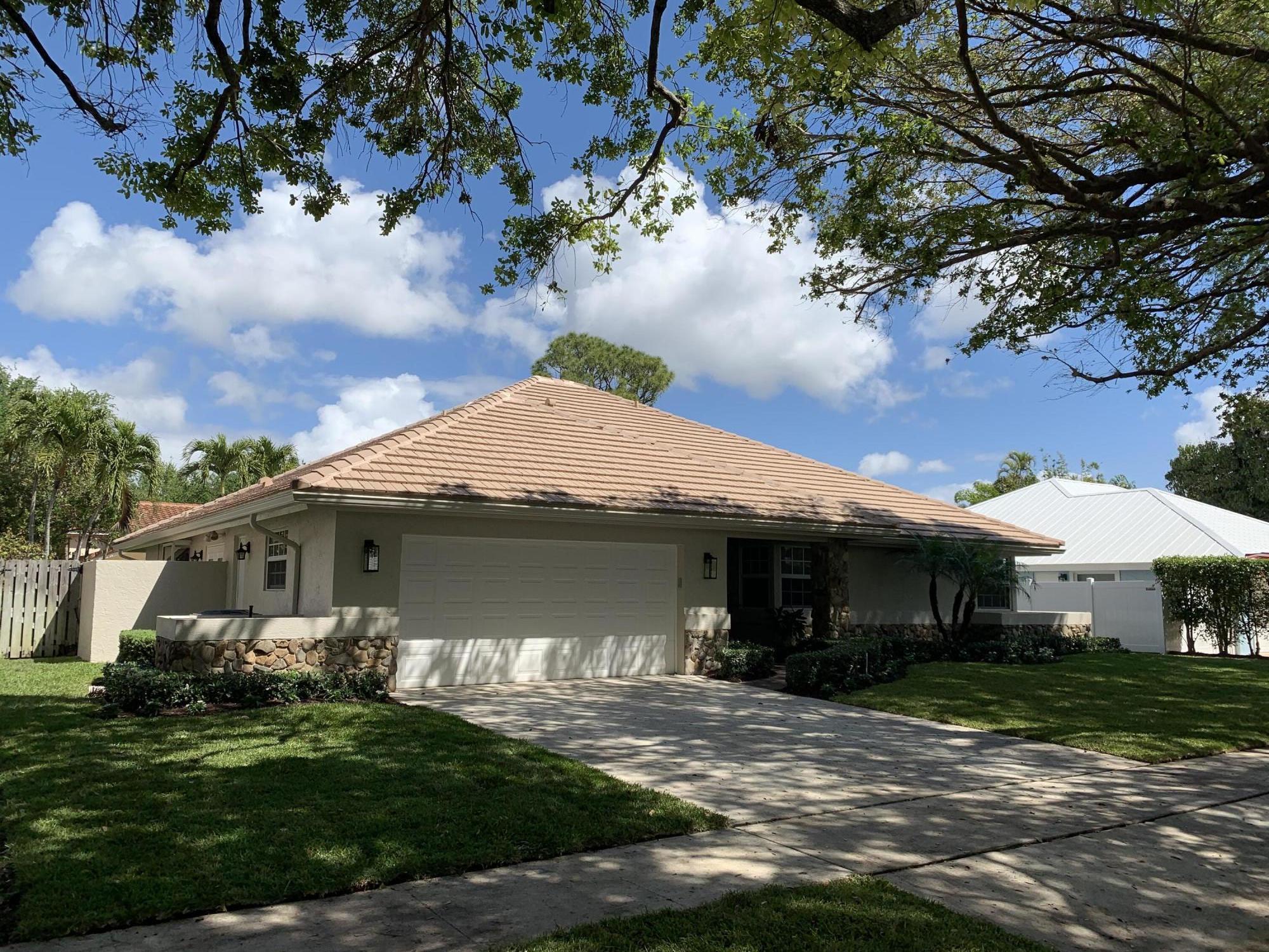 2629 Northwest 41st Street Boca Raton, FL 33434 - Photo 3 of 6 Exterior Left Side