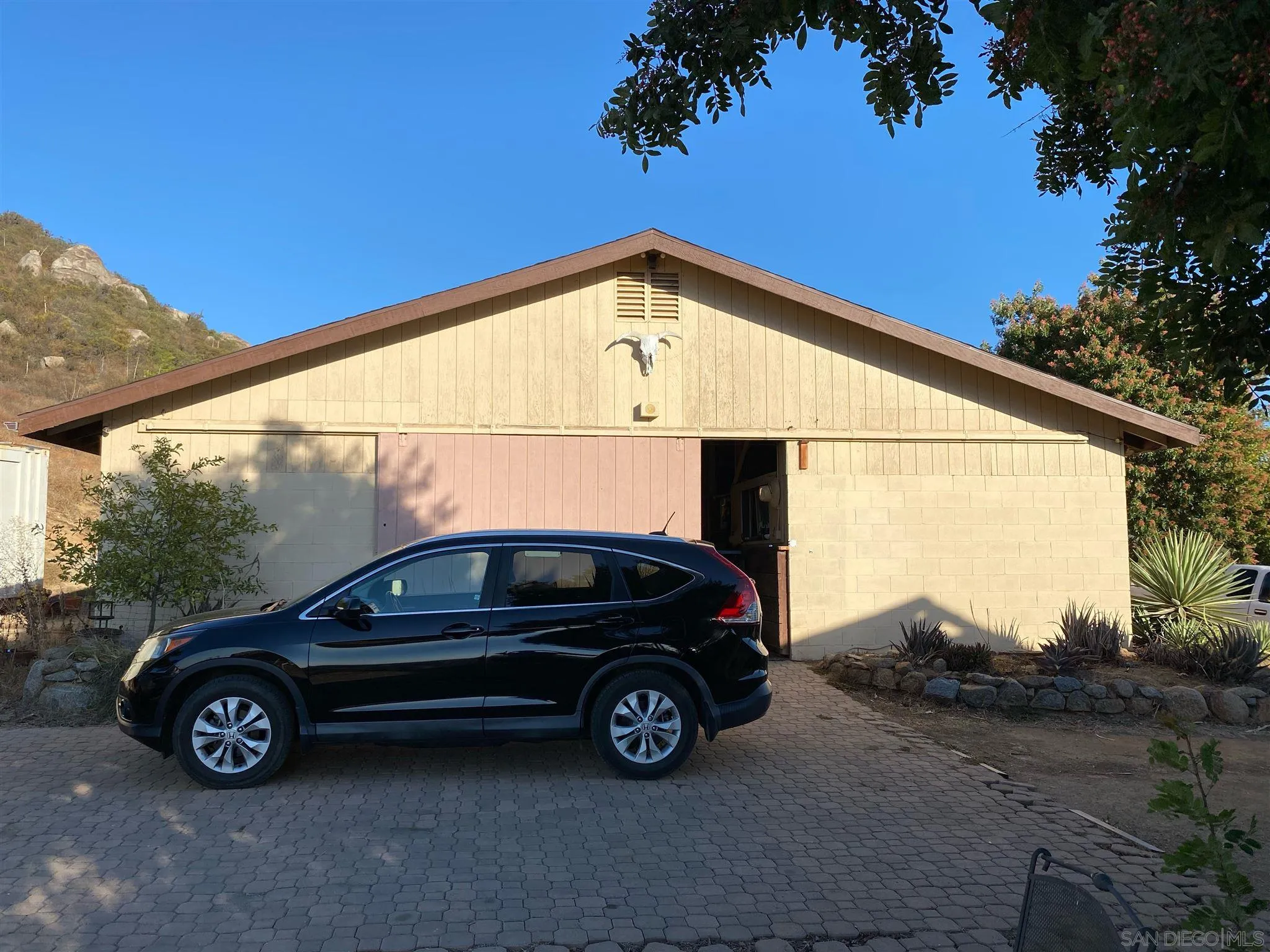 30550 Miller Road Valley Center, CA 92082 - Photo 2 of 23 a car parked in front of a house