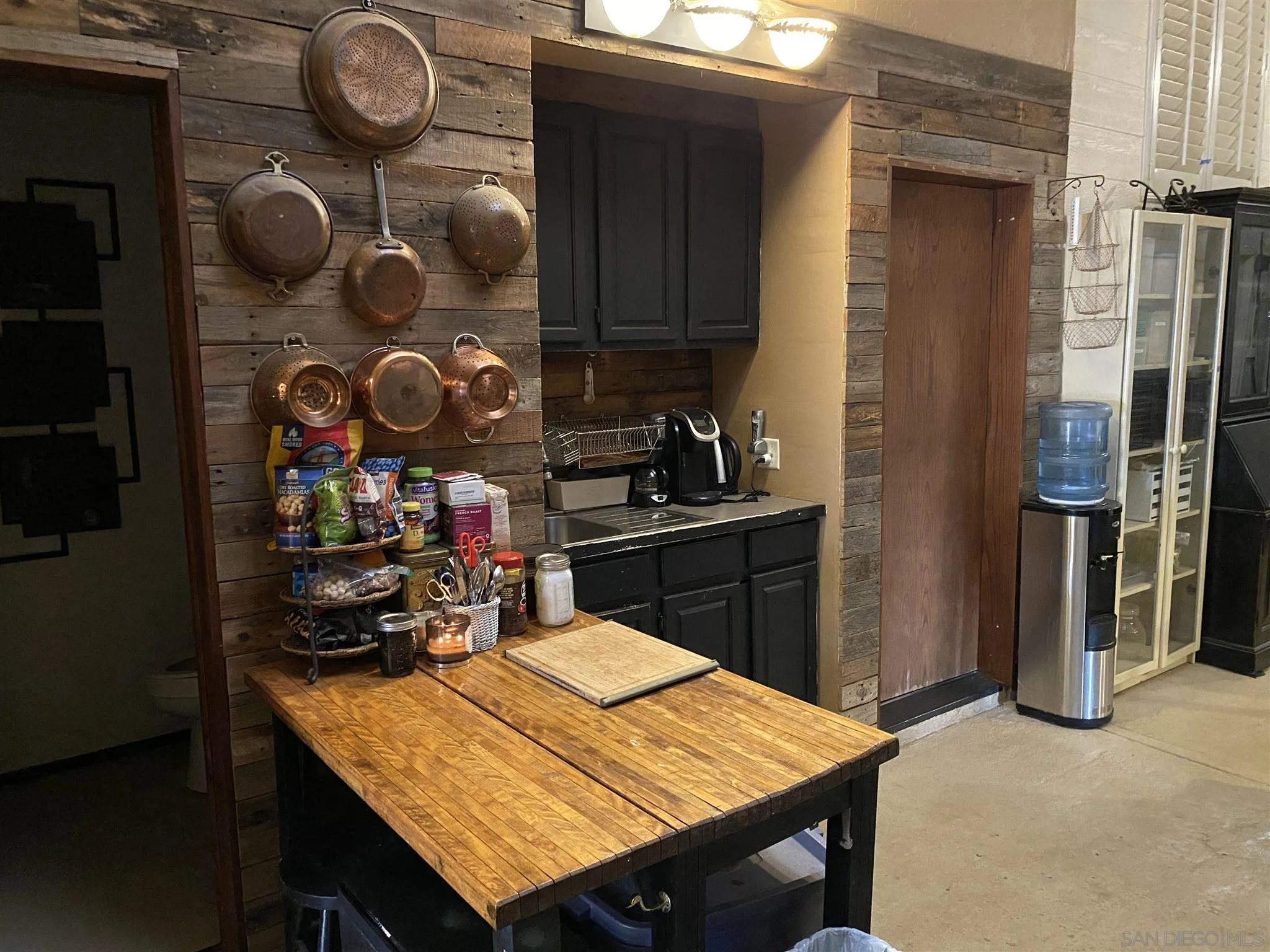 30550 Miller Road Valley Center, CA 92082 - Photo 3 of 23 a kitchen with a table and a stove