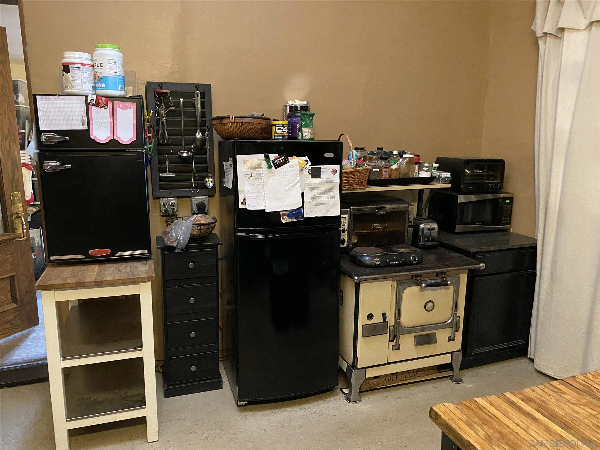 30550 Miller Road Valley Center, CA 92082 - Photo 4 of 23 a kitchen with a stove and a refrigerator