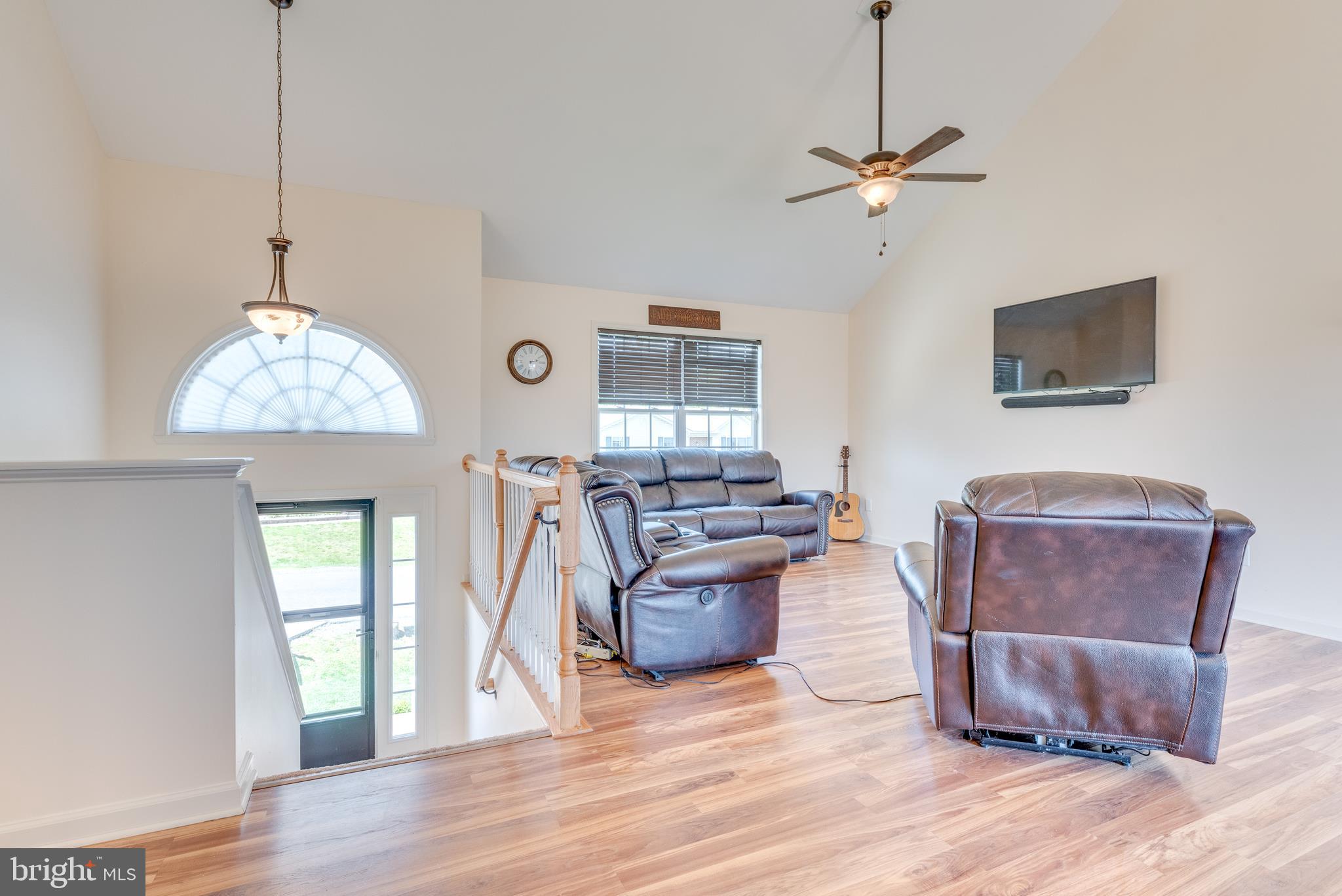 72 Gibson Road Inwood, WV 25428 - Photo 8 of 57 The large living room features vaulted ceilings