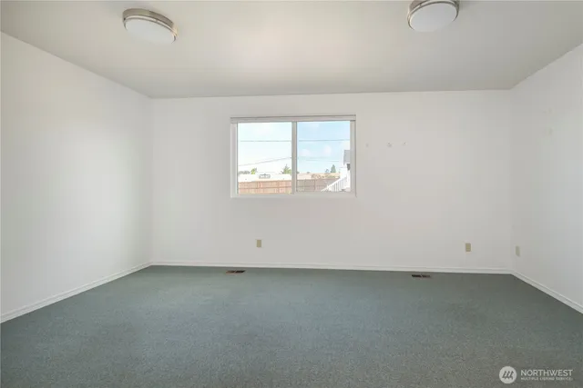 an empty room with a window