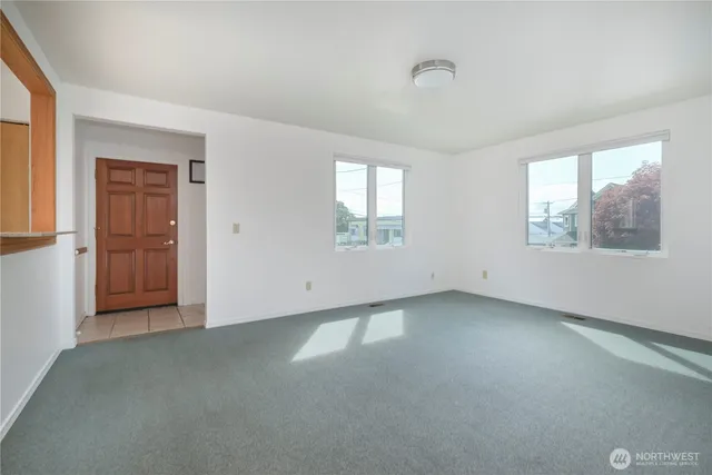 an empty room with windows