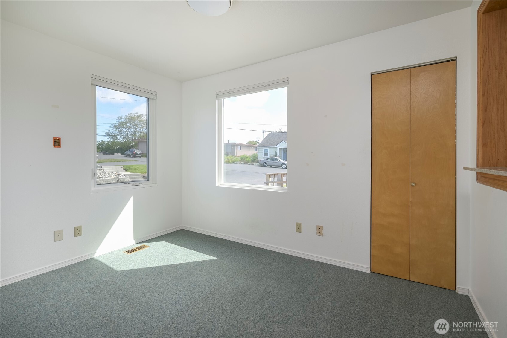 1121 Southeast Dock Street Oak Harbor, WA 98277 - Photo 9 of 28 a view of an empty room with a window