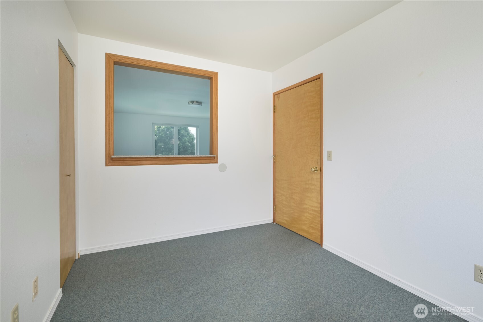 1121 Southeast Dock Street Oak Harbor, WA 98277 - Photo 10 of 28 an empty room with a window