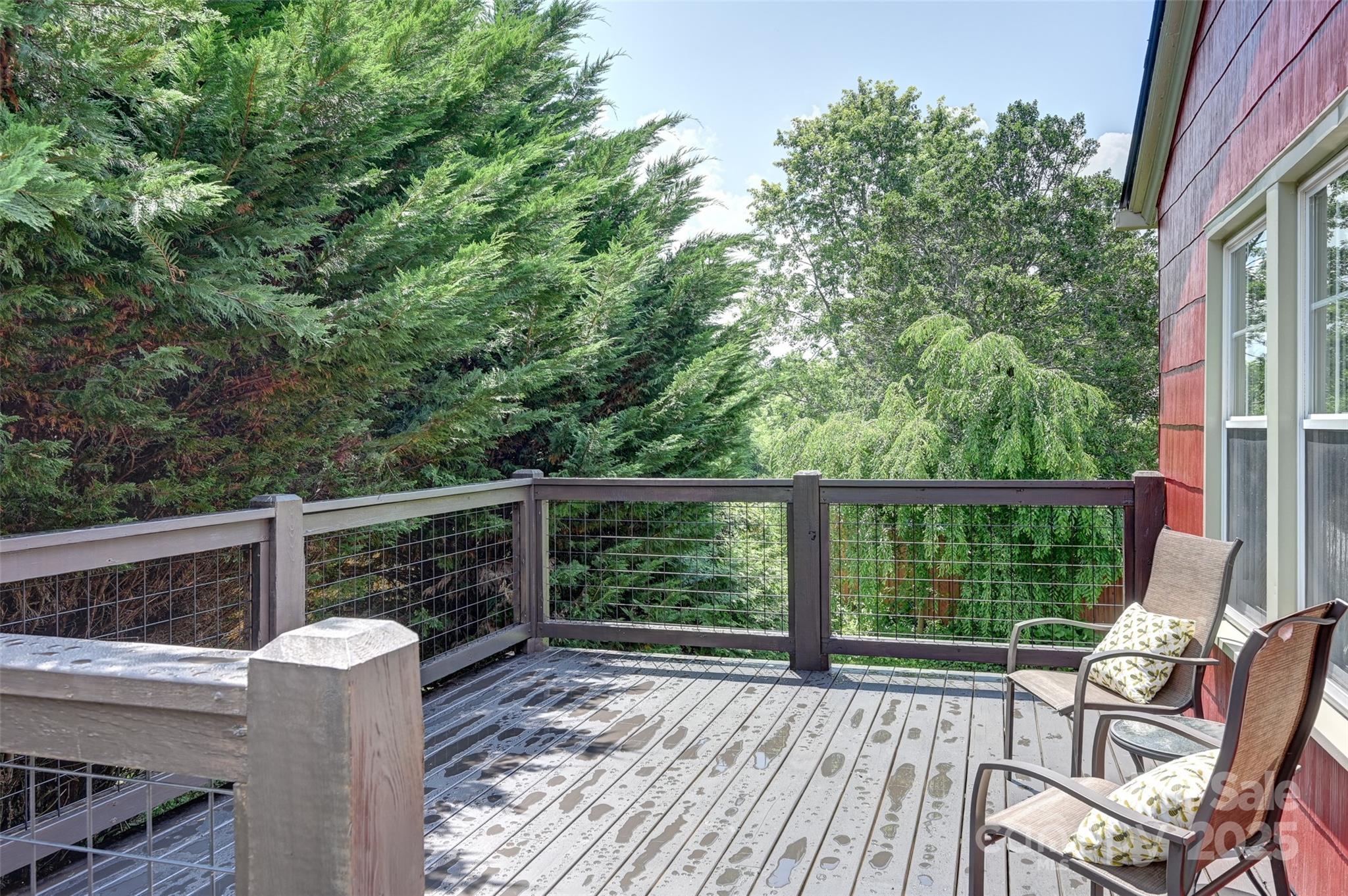14 Monroe Street Brevard, NC 28712 - Photo 14 of 48 a view of balcony with wooden floor and outdoor seating
