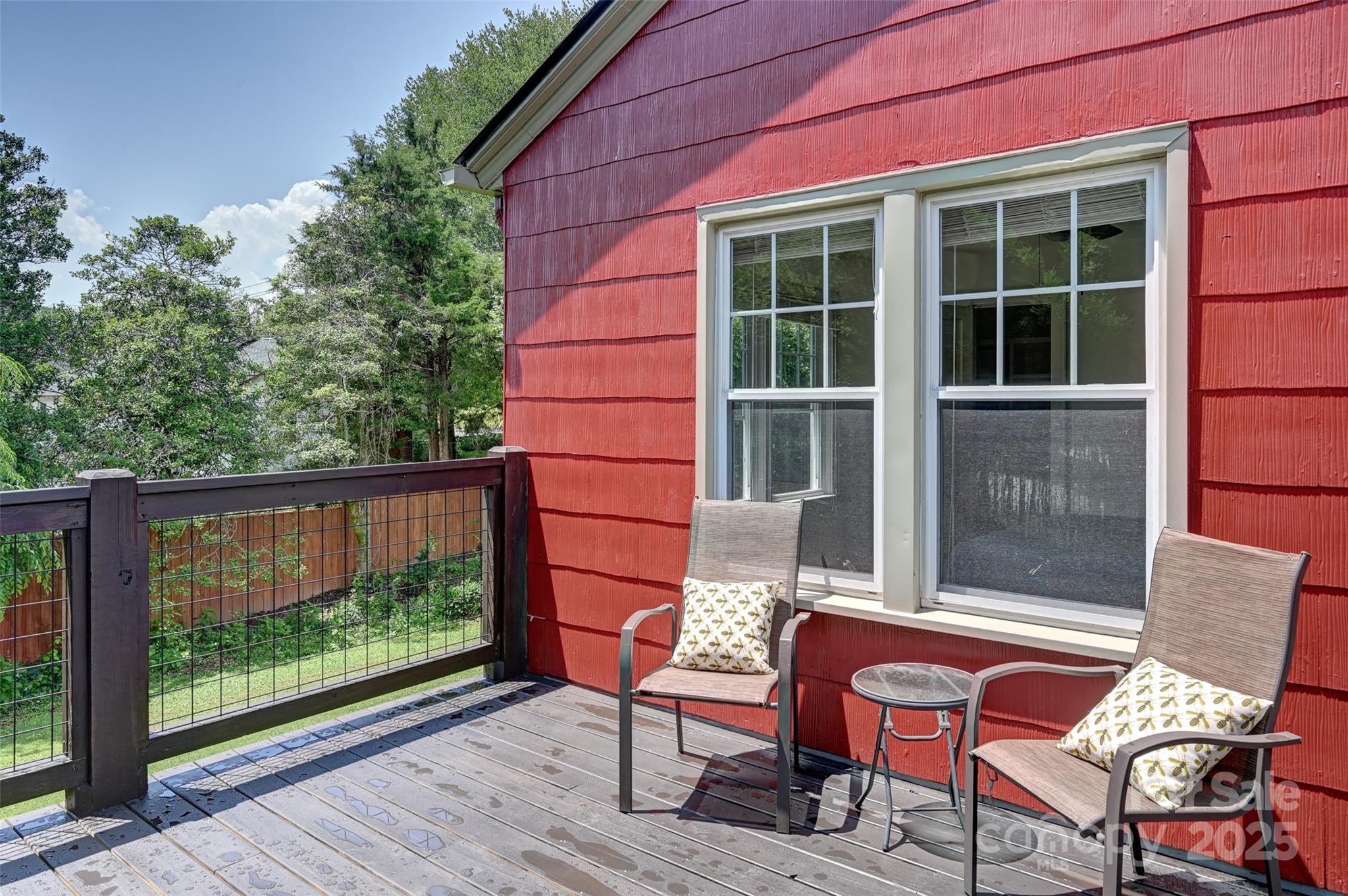 14 Monroe Street Brevard, NC 28712 - Photo 15 of 48 a view of a two chairs in the balcony