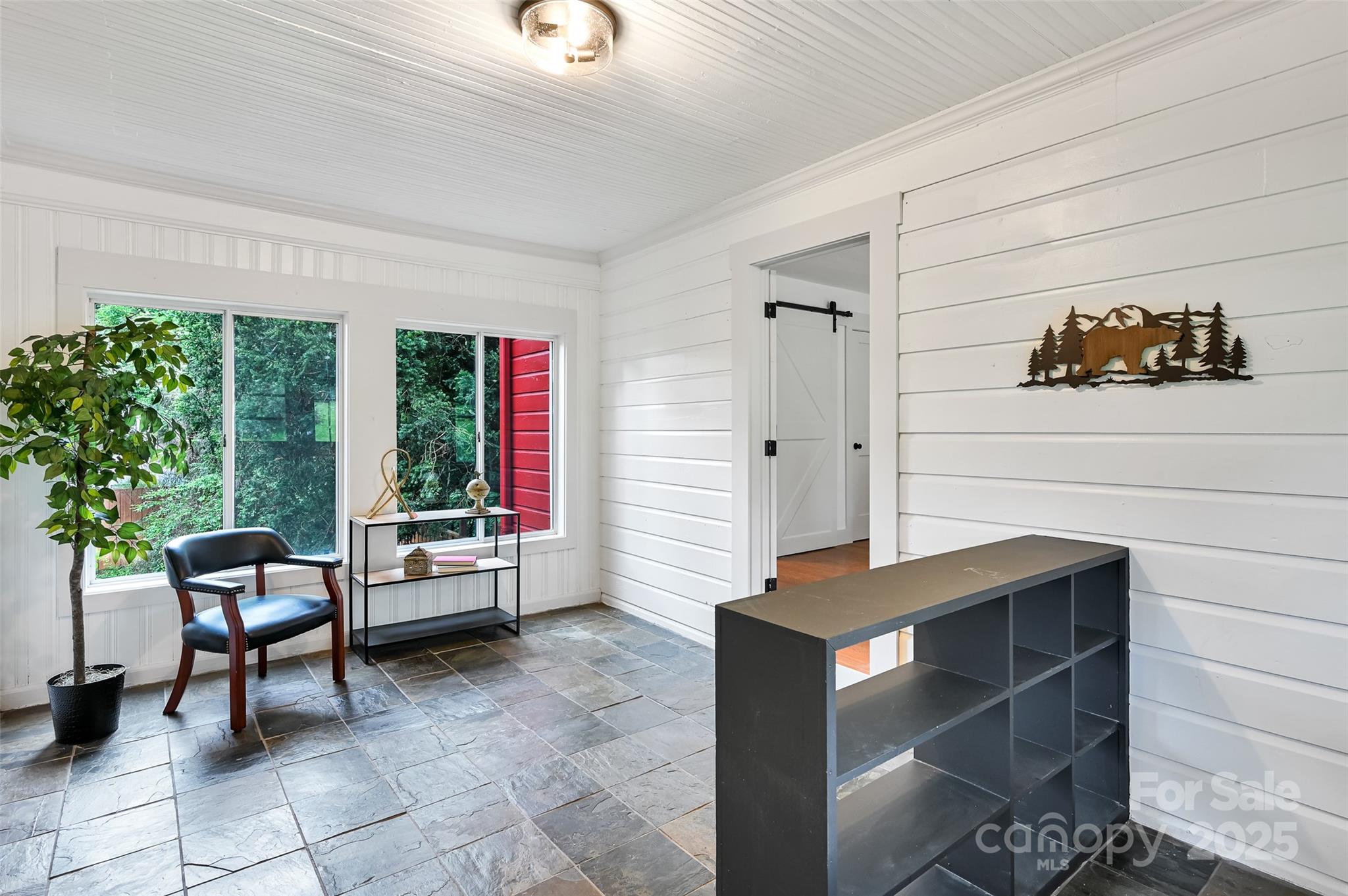 14 Monroe Street Brevard, NC 28712 - Photo 27 of 48 a living room with furniture and a window