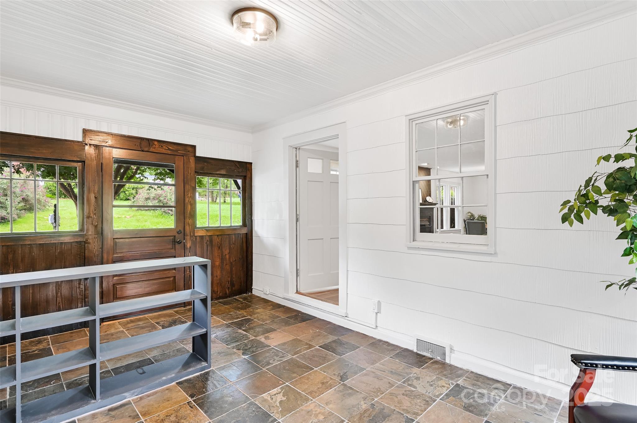 14 Monroe Street Brevard, NC 28712 - Photo 29 of 48 a view of an empty room and window