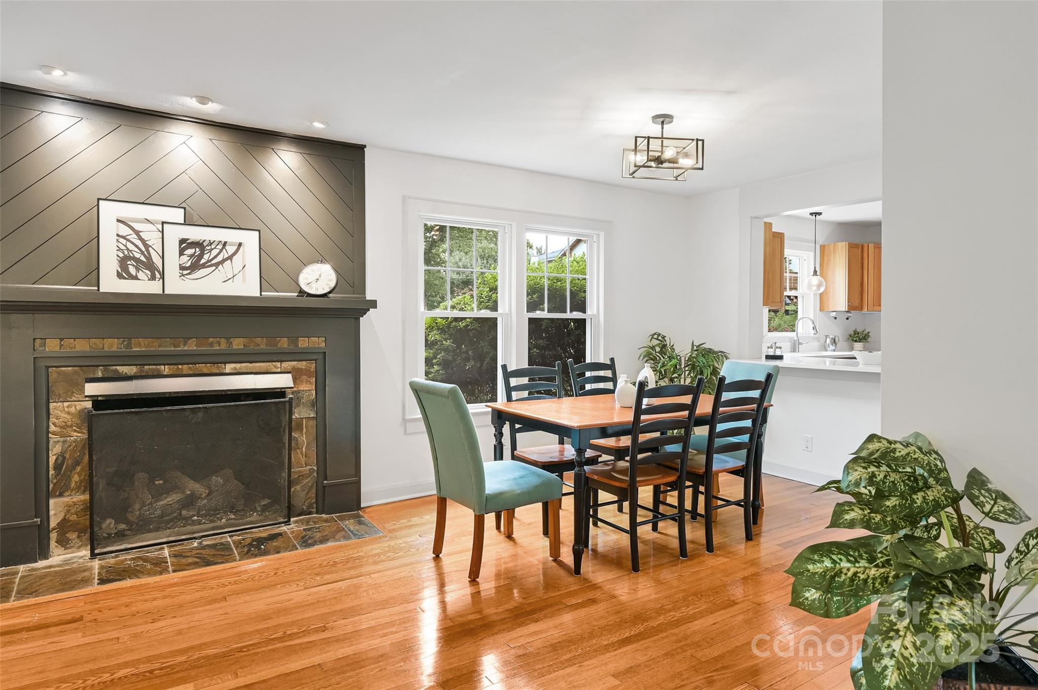 14 Monroe Street Brevard, NC 28712 - Photo 33 of 48 a view of a dining room with furniture window and wooden floor