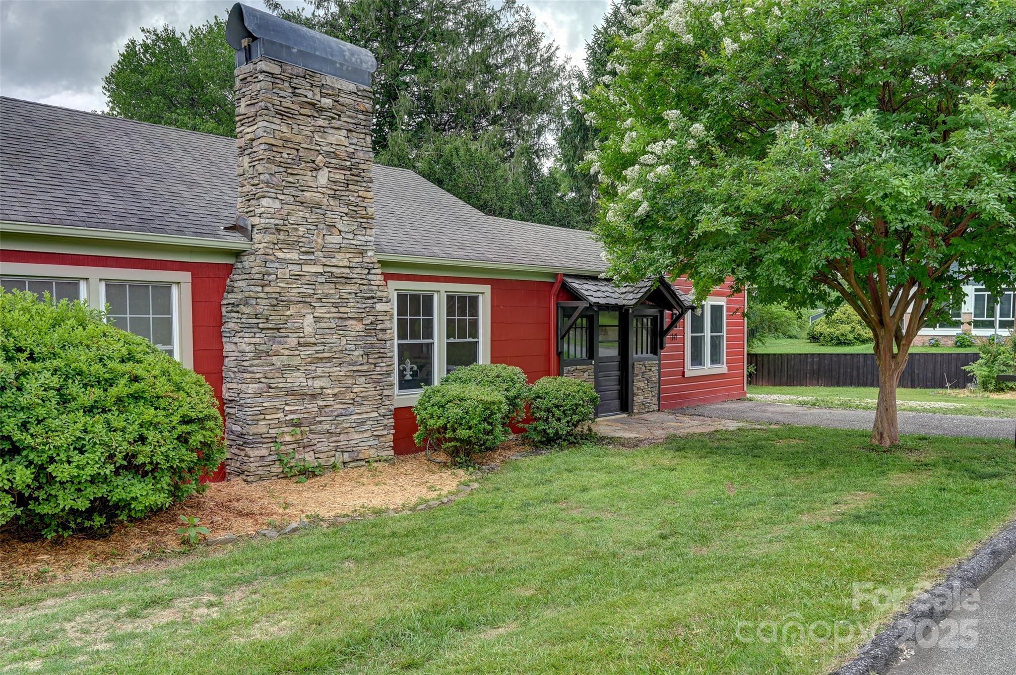 14 Monroe Street Brevard, NC 28712 - Photo 4 of 48 front view of a house with a yard