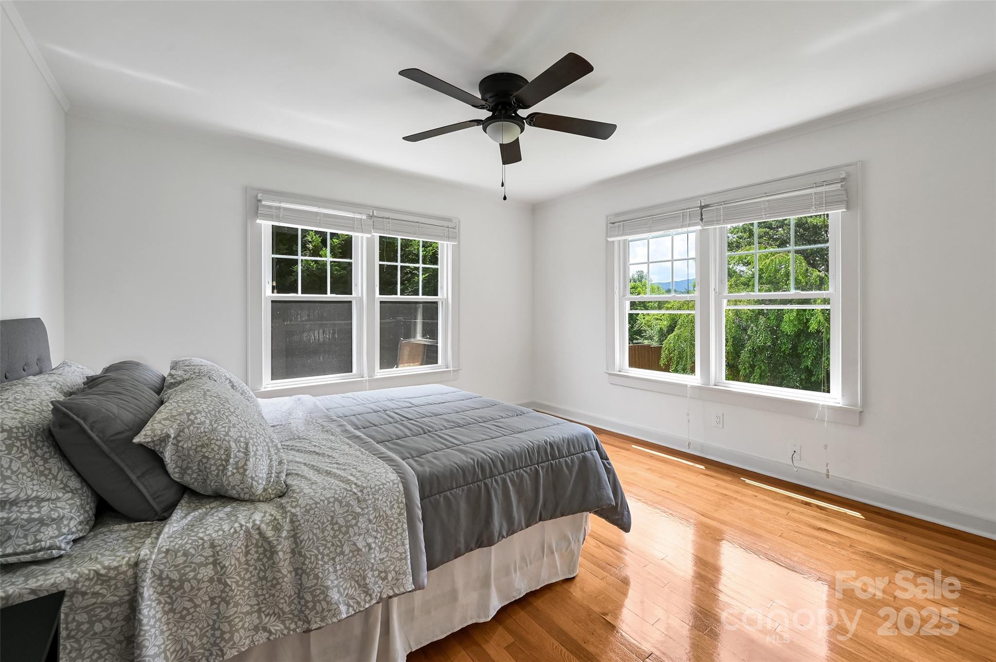 14 Monroe Street Brevard, NC 28712 - Photo 43 of 48 a bedroom with a bed and window