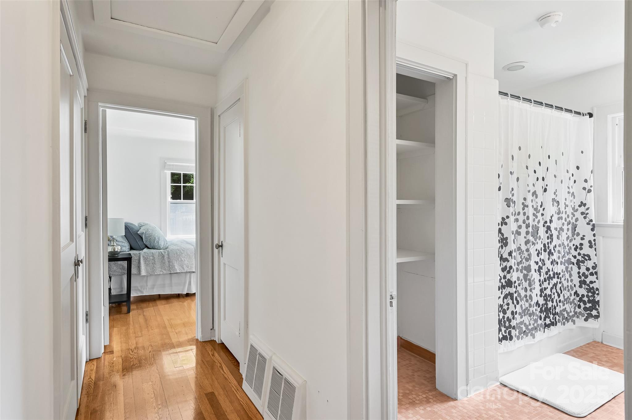 14 Monroe Street Brevard, NC 28712 - Photo 45 of 48 a view of a bathroom from a hallway